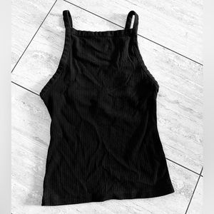Free people slightly cropped length black cotton tank.